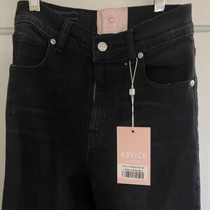 Black flare Revice Farrah/Midnight Jeans. Never worn, tags still on.